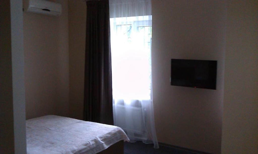Yuzhniy Dvorik Lejlighedshotel Odessa Værelse billede